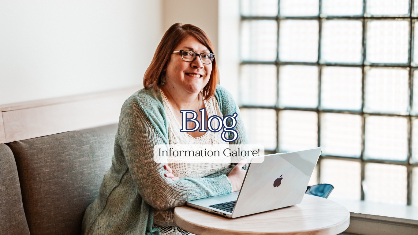 Blog header-picture of woman sitting at a table with an open laptop